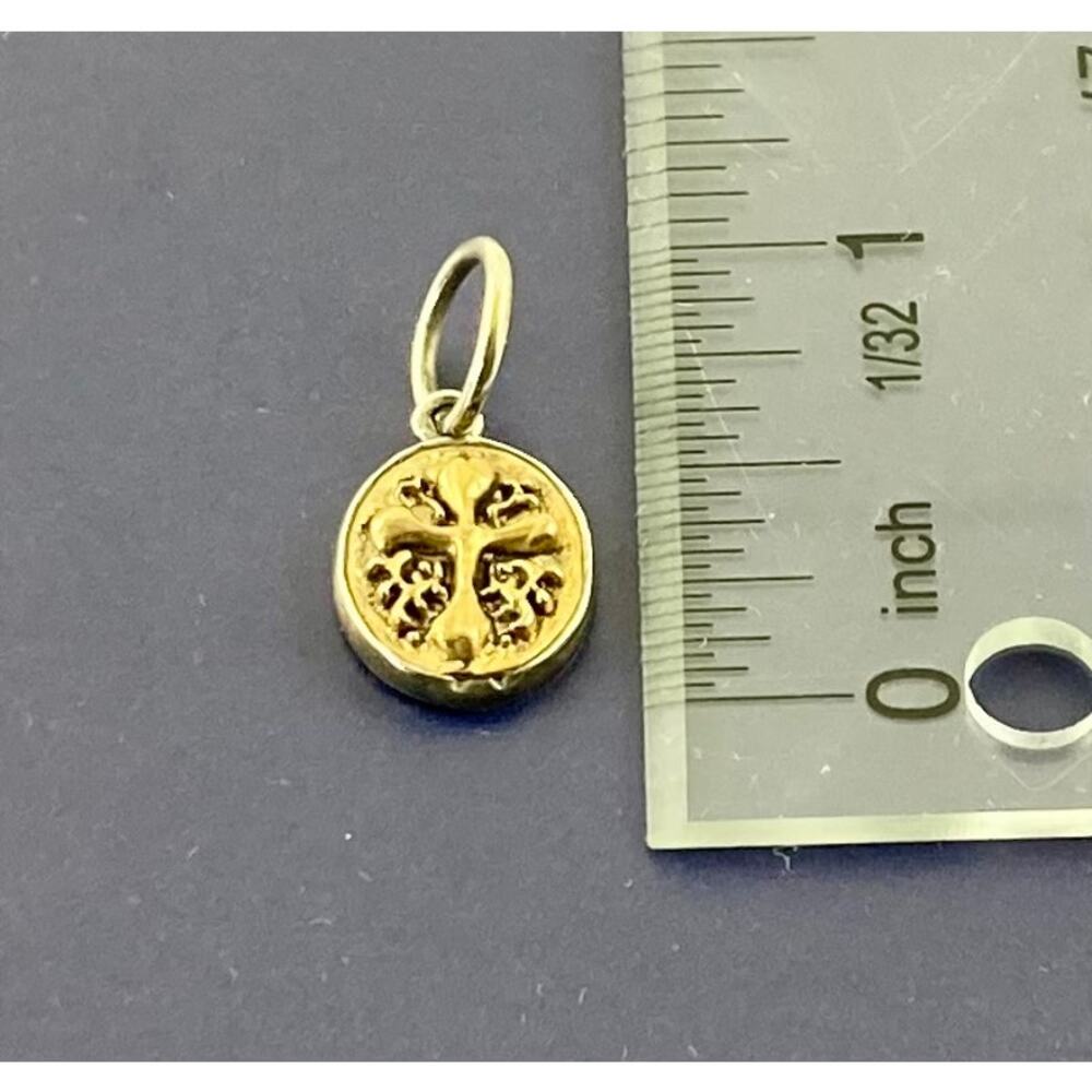 Waxing poetic cross charm